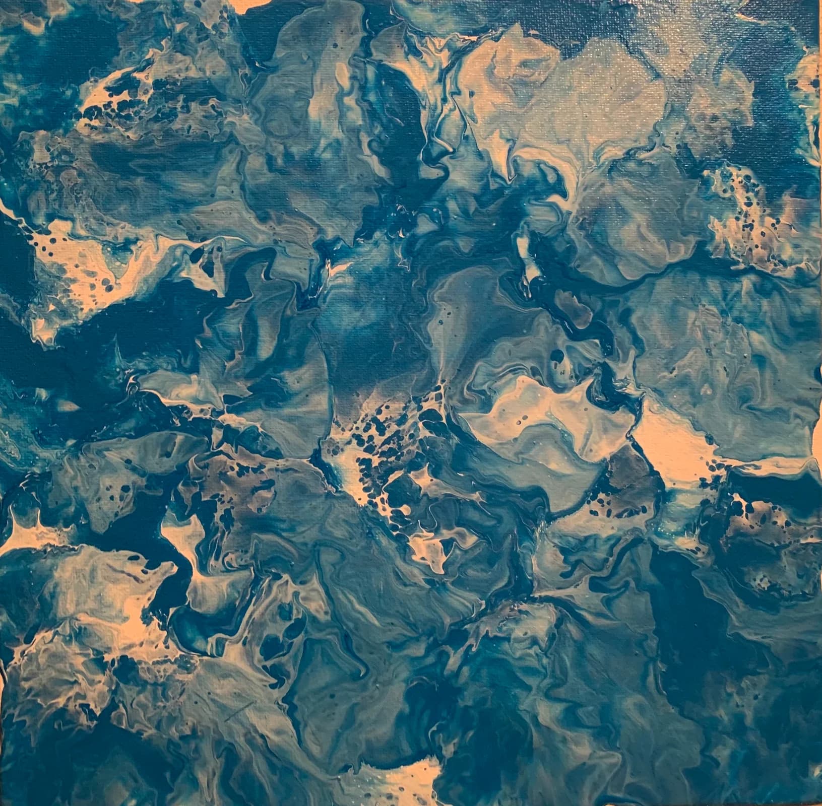 Blue, gray, and warm cream abstract marbled painting