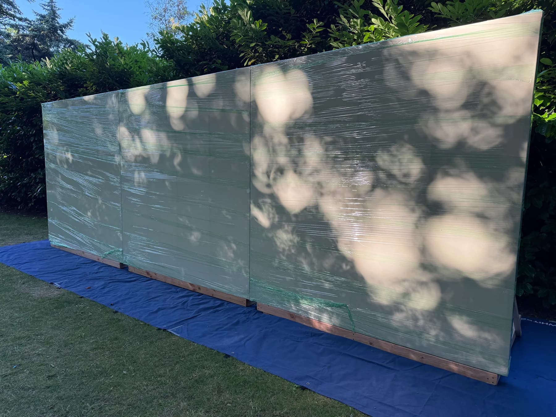 Large-format canvases are protected and prepared for transport to the event site. Canvases are installed with protection and weatherproofing as needed.